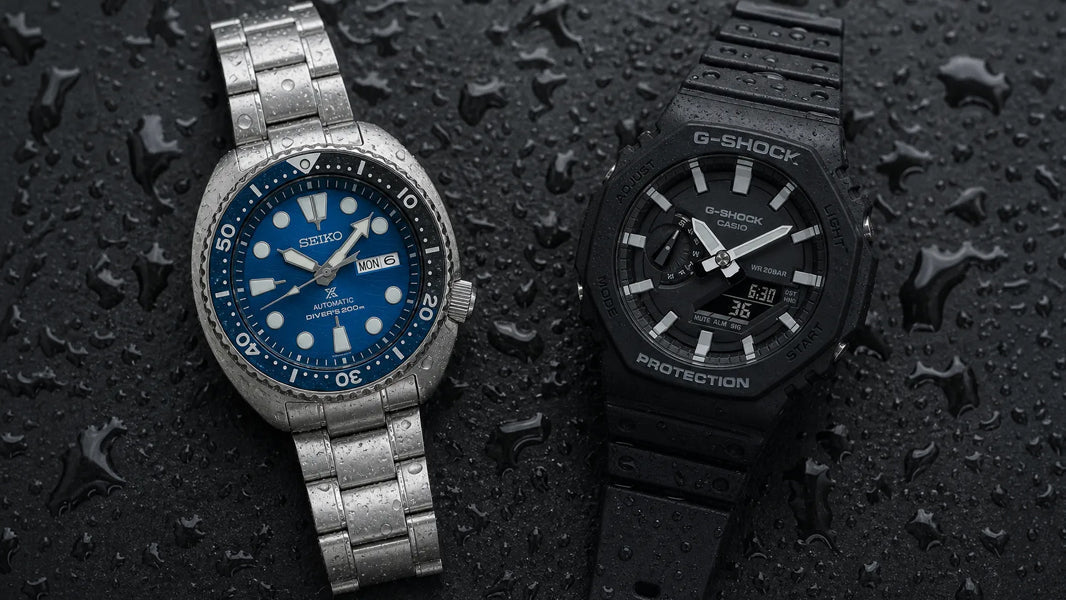 Seiko Prospex Turtle SRPD and G-Shock GA-2100 flat-lay on wet dark surface