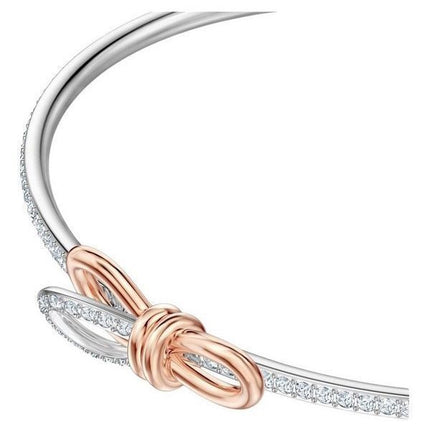 Swarovski Lifelong Bow Rhodium Plated Oval Shaped Bangle With White Crystal 5447079 For Women